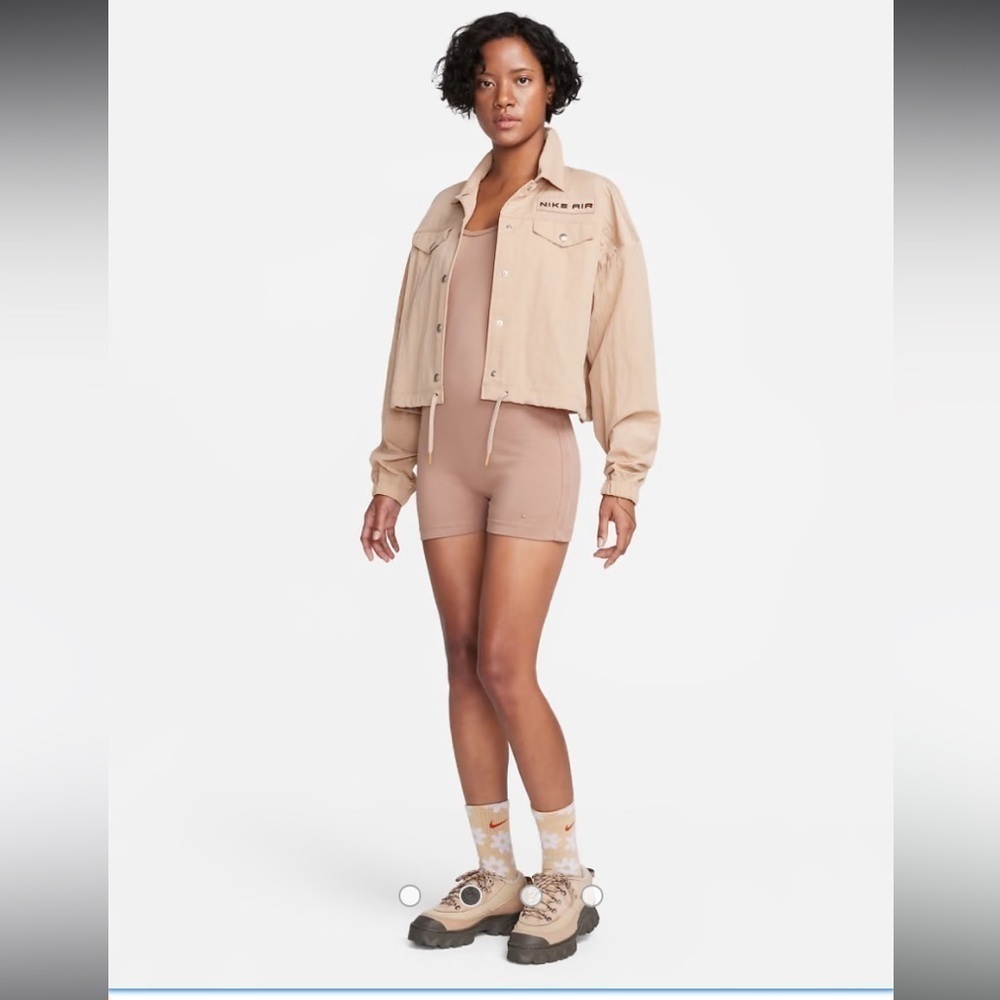 Nike one piece jumpsuit with tape detail in beige